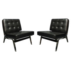 A pair of Cassina 856 lounge chairs by Ico Parisi