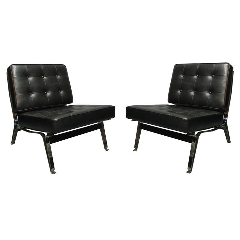 A pair of Cassina 856 lounge chairs by Ico Parisi