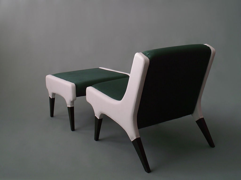 A pair of lounge chairs with ottomans by Gio Ponti 1