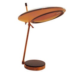 A table lamp by Oscar Torlasco for Lumi