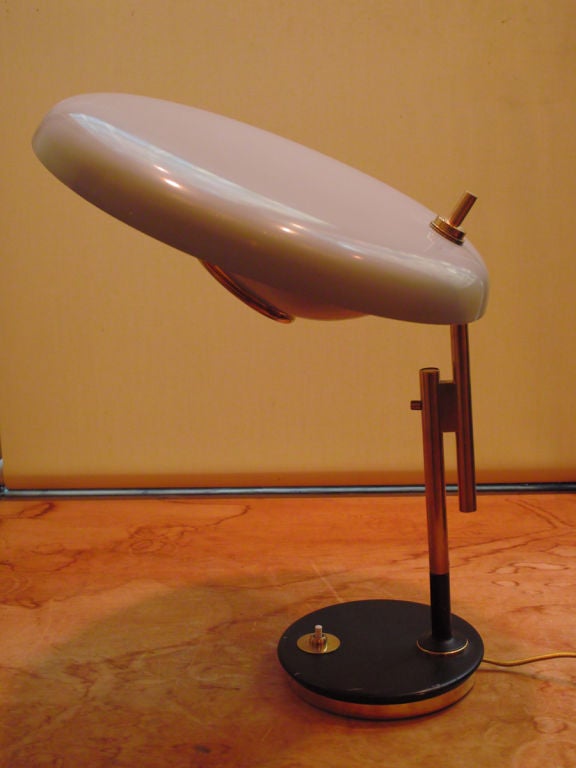 A table lamp by Oscar Torlasco for Lumi, with the manufacturer's label