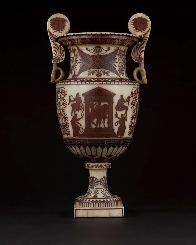 Probably Rome. The volute krater form with extensive red and black Etruscan painted decoration including classically robed figures within a temple, gorgon masks, Greek key and anthemion motifs. Detailed research report available on request.