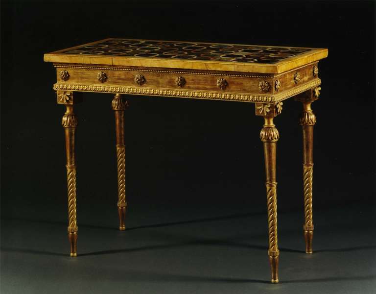 A PAIR OF GILTWOOD NEOCLASSICAL SIDE TABLES ATTRIBUTED TO J.C. LILLIE WITH TOPS OF VOLCANIC STONES AND MARBLES POSSIBLY BY GIUSEPPE CANART

The Bases Danish, made for the tops. The Tops Italian. 
Both Last Quarter Of The Eighteenth