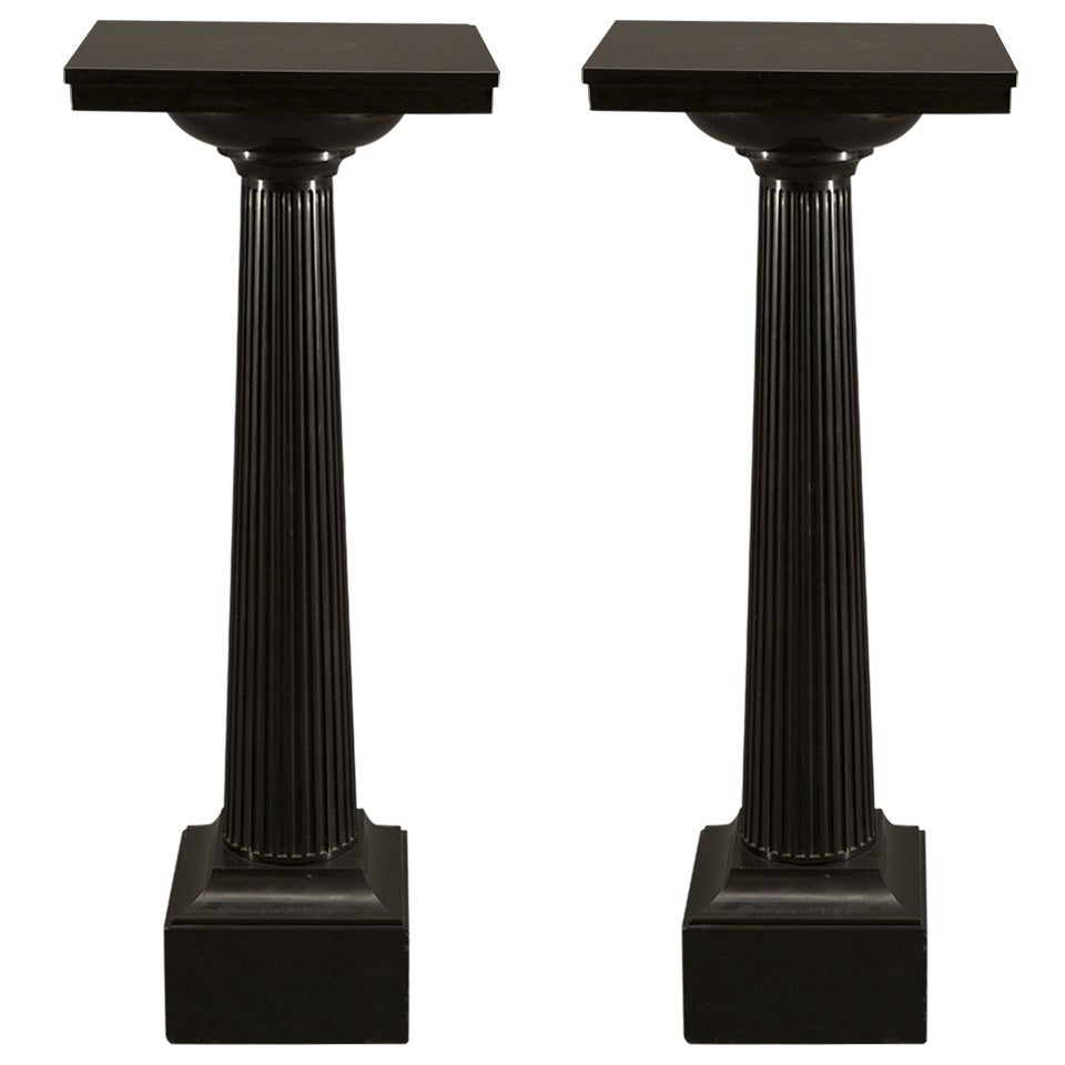 A Superbly Drawn And Executed Pair Of Columnar Ashford Black Marble Stands For Sale