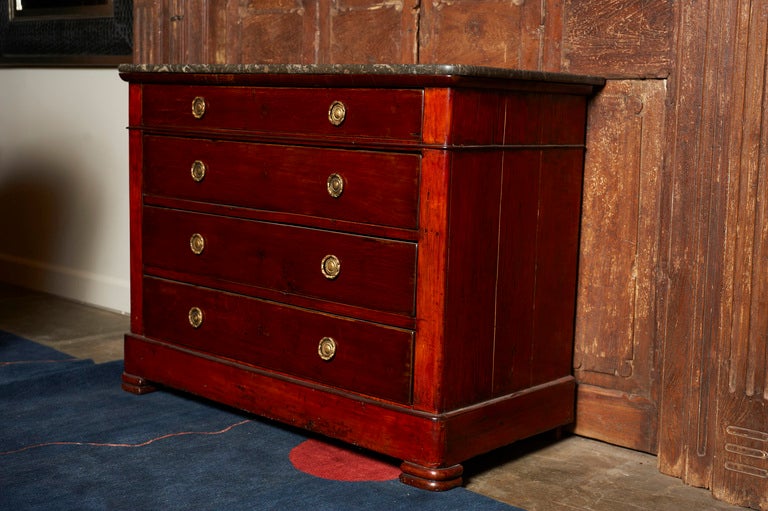 French mahogany 4-drawer commode of the Louis Philippe period, c. 1860, cock bead moldings to the sides, and a dark gray veined marble top.