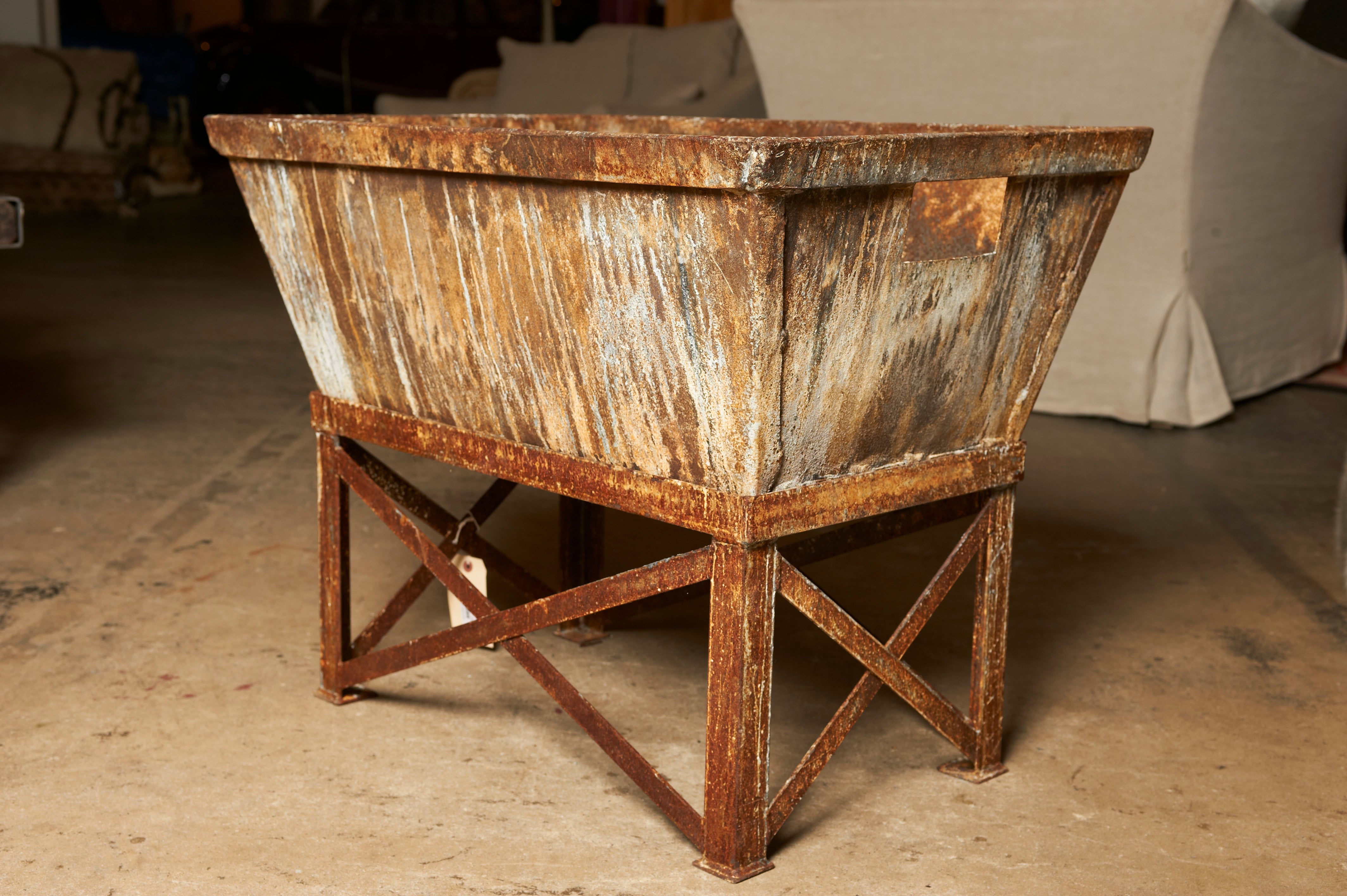 Industrial iron factory bin on stand, c. 1940-50, now a jardiniere For Sale