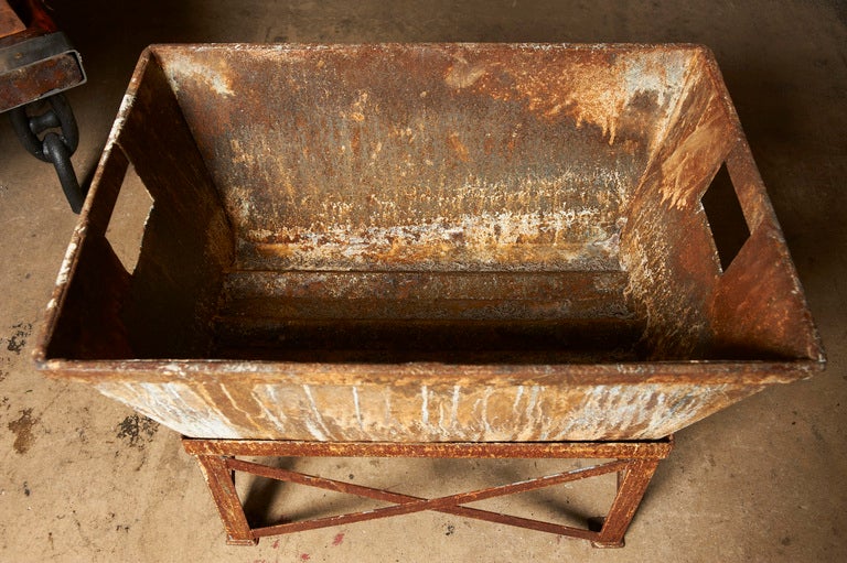 American Industrial iron factory bin on stand, c. 1940-50, now a jardiniere For Sale