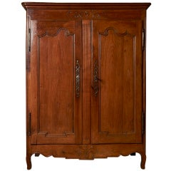 Antique French fruitwood small armoire, c. 1790-1820