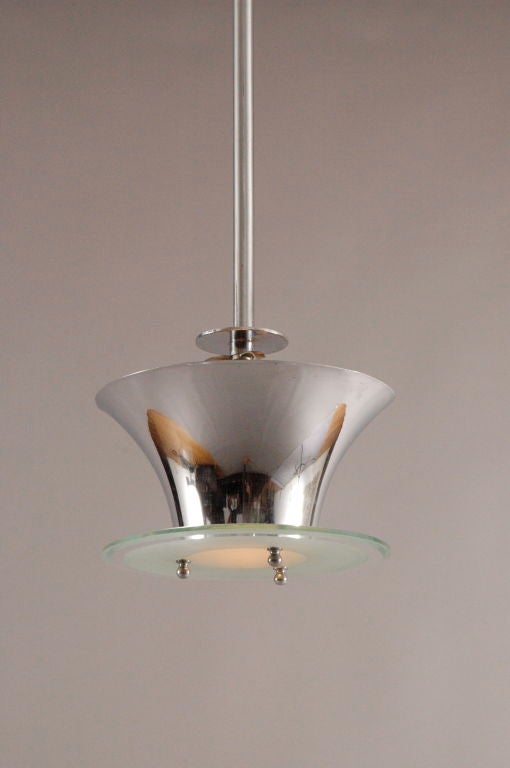 Very nice chrome plated metal , etched and partially beveled glass pendant. 
All original finish.