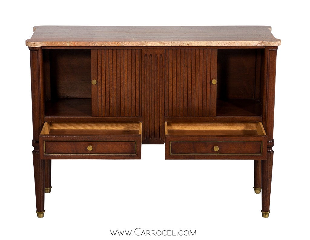 Elegant Tambour door console, credenza, server cabinet. Classic fine lines and gently flowing Louis XVI turned legs with brass caps define this fine piece of French artistry. Made from European cherry wood this piece has practical storage with