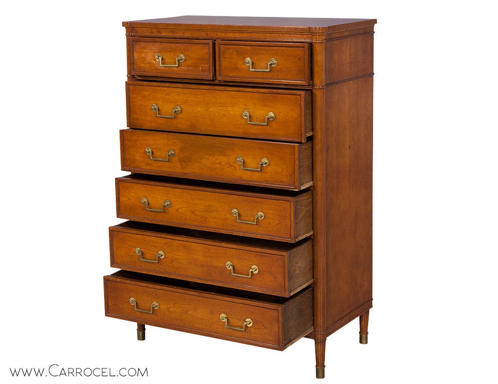 Elegant and stylish, cherry wood American classic chest of drawers made by Widdicomb of Grand Rapids Michigan. Quality construction, with solid wood dovetail joinery.