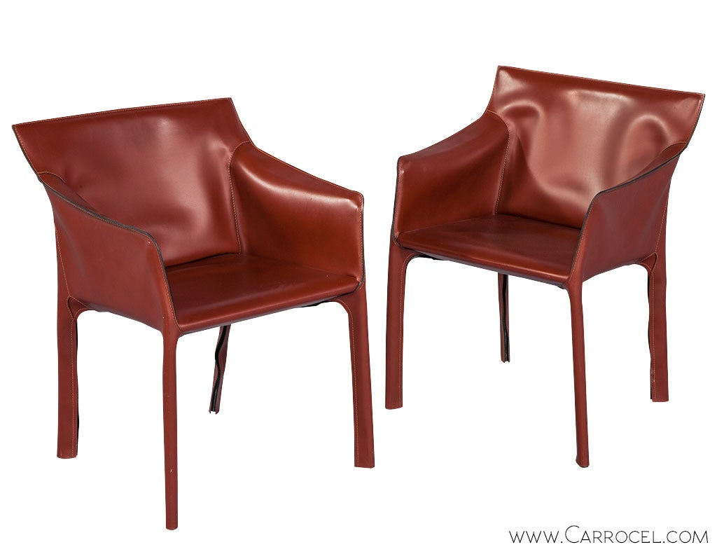 Minimalist style chair constructed of a metal frame covered in dark red leather. Italian made chairs all signed Matteo Grassi.
