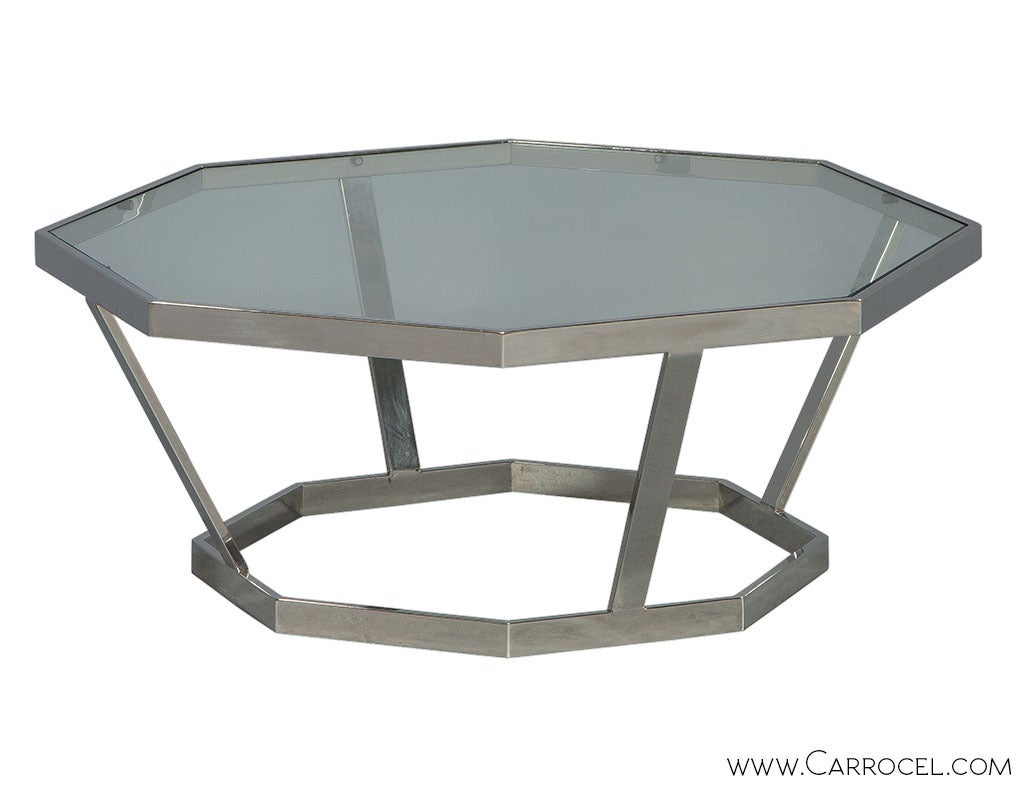 Mid Century Modern octagonal shape cocktail table with chrome frame and glass top.