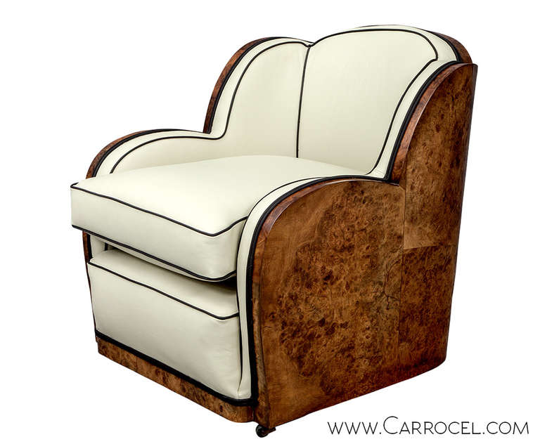 A very rare and original pair of art deco arm chairs, completely professionally restored by our master craftsmen from the frame up. these magnificent chairs are a stunning example of art deco at it's finest. the outer back of the chairs are the