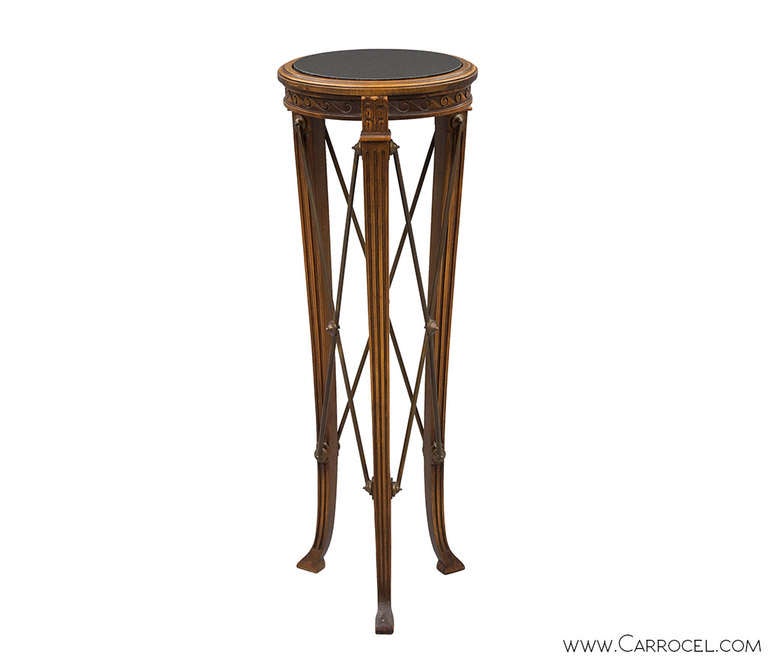 Regency Style-Antique Marble Top Decorative Stand. Hand carved walnut with brass details. Exceptional pair of stands classically designed with solid brass X stretchers, scroll carving and fine detailed accents on the legs.