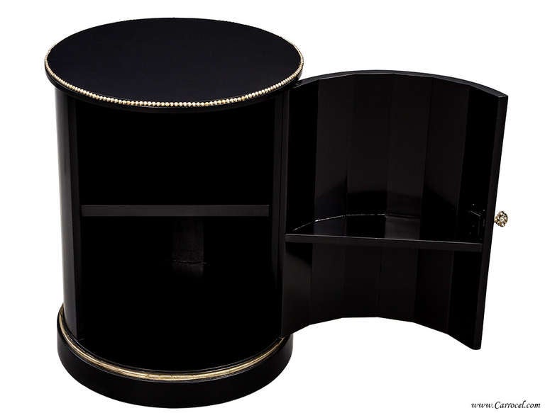Antique American piece, circa 1920, that have been restored by our master artisans.  Finished in an absolutely STUNNING black lacquer that has been painstakingly hand rubbed, it also features old world silver leaf accenting all done by a single