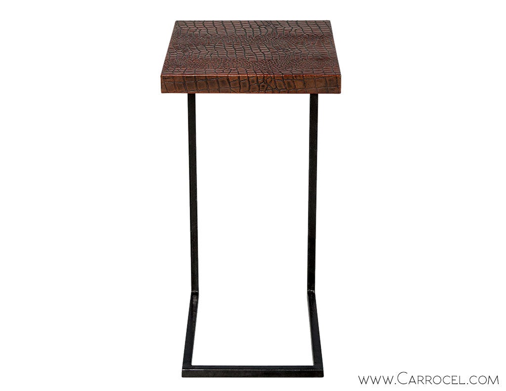 Fashionable utility table with an iron base and rich brown croc embossed top. Perfect to pull up for a martini, laptop, reading etc.