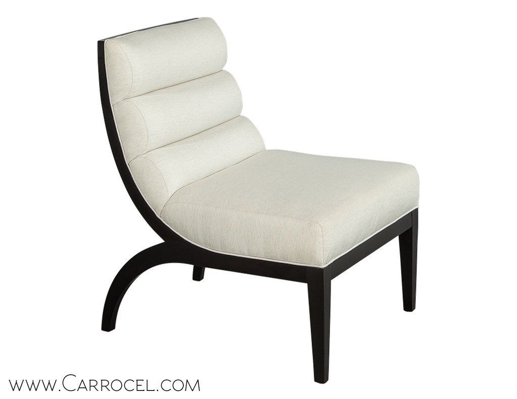 Elegant and sleek slipper chair with custom ebony lacquer finish and fine dove grey upholstery. These chairs can be custom ordered in different finishes and fabrics. Inquire for pricing.
