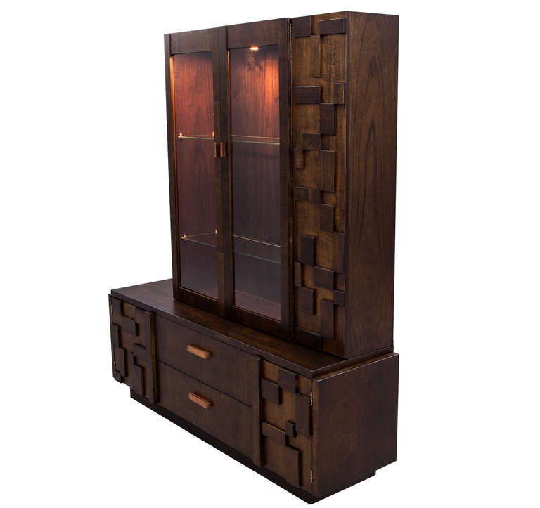 Designed by Altavista Lane as part of the mosaic series. Two glass display shelves in the top unit and two drawers with two cabinets in the bottom unit.