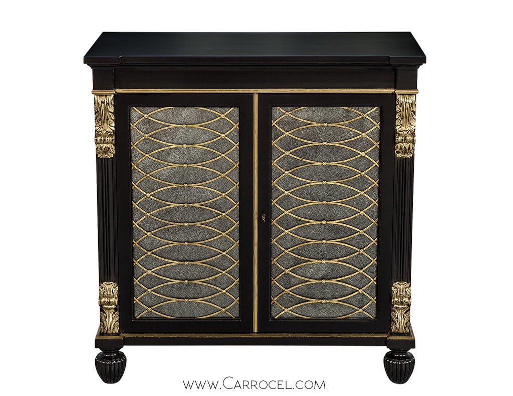 Pair of Antique Neoclassic Louis XVI Commodes, custom finished by Carrocel in satin ebony hand rubbed lacquer with gold leaf highlighting acanthus leaf carved motifs. The cabinet compartments are accessible through brass grill work door fronts