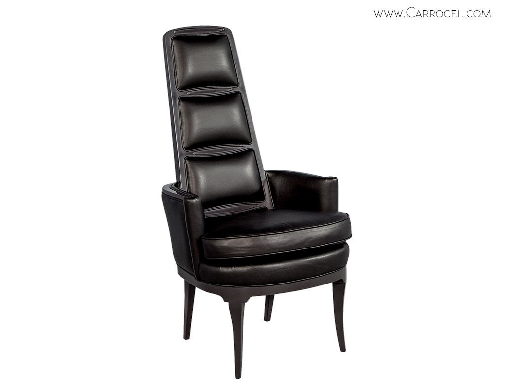 Pair of Unique Mid Century Modern raised panel back arm chairs. Space age in design with individual insert back panels, these high back chairs are finished in a charcoal satin lacquer with black butter soft Italian leather. Perfect for a living