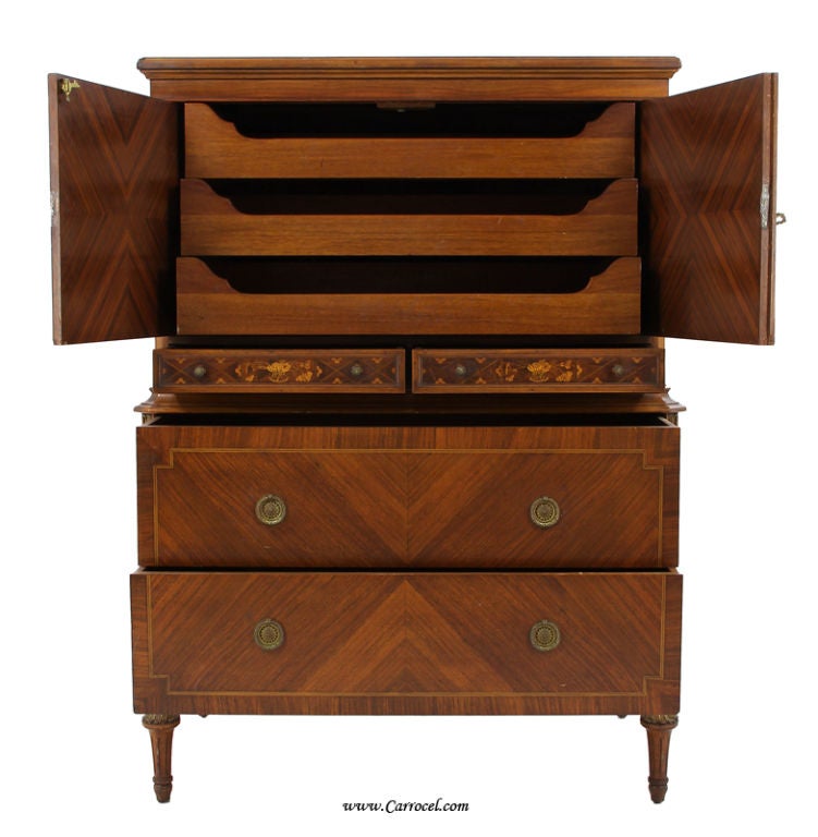 This is an antique bedroom dresser made in the 1920s in NY.  It is in beautiful condition having developed a rich patina that only comes from decades of care and life.  It is an Adam style piece with hand-applied floral marquetry using a combination