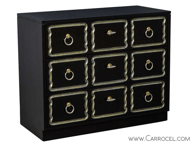 Dorothy Draper Style Chest customized by Carrocel. Restored in black lacquer with distressed silver leaf trim and accents. Circa 1960, mid century modern design.