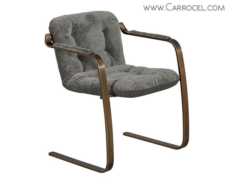 Pair of Cantilever Lounge Chairs. Restored by Carrocel. Featuring solid brass support and newly upholstered fabric.
