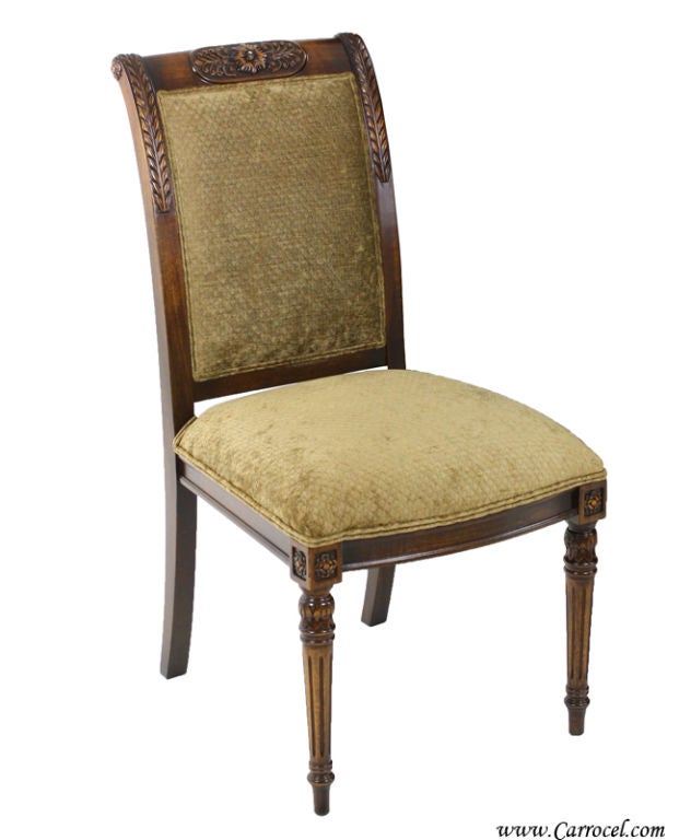 These classic Empire styled dining chairs are American made by E.J. Victor and finished here in our shop by our skilled craftsmen.  Fine carvings and a beautiful rich dark brown finish come together with this gorgeous designer fabric to create a