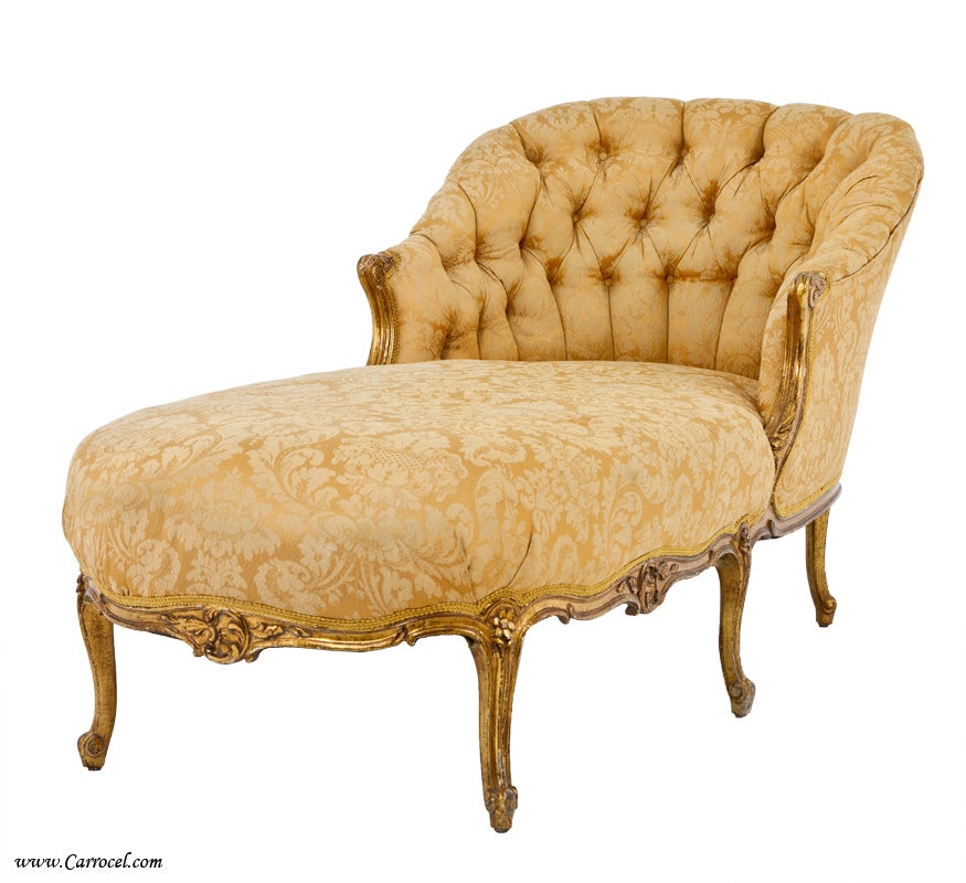 This is an American chaise longue with Louis XV styling and gold two tone Damask fabric.  It is in original very good condition.  Ideal as a comfortable and stylish place for a leisurely lie down or as a soft place to curl up with a good book and a