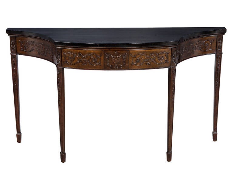 Antique carved two-tone console table. Perfect for hallways or entrances with its perfectly length and narrow profile.