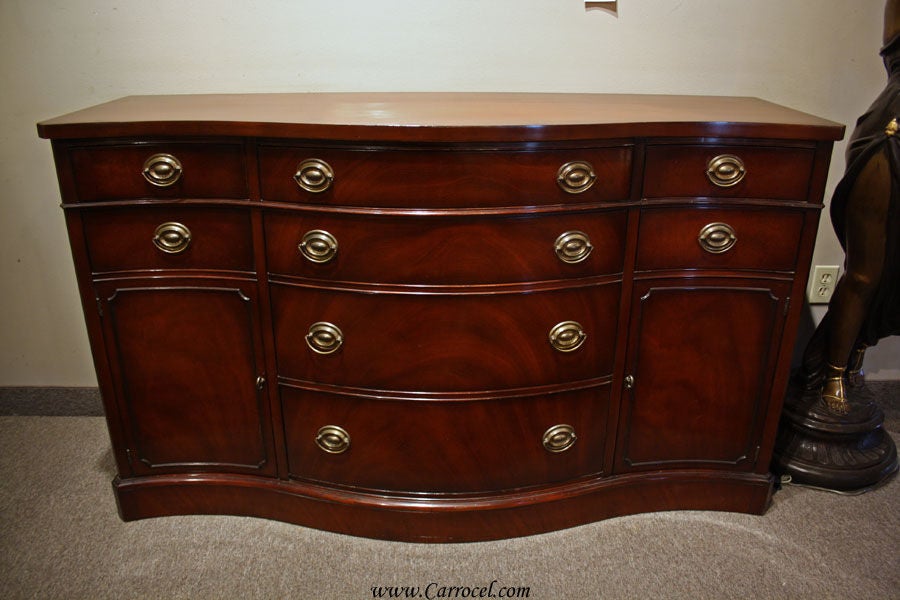 Drexel Furniture, one of the many fine North Carolina-based furniture makers of the 20th century, made this wonderful sideboard buffet in the 1930 or 1940s. It's date is not known exactly, however, it is in its original pristine condition and its