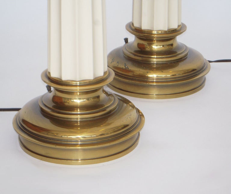 Columnar design Ivory glazed ceramic and brass table lamps. Stiffel label on each. 
