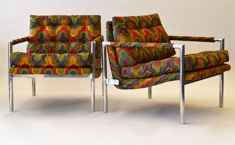 Pair of super sleek aluminum-frame lounge chairs in vivid tufted upholstery.