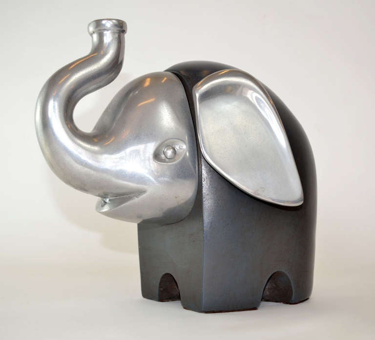 Modernist pottery and aluminum elephant sculpture. Glazed earthenware body with aluminum features.