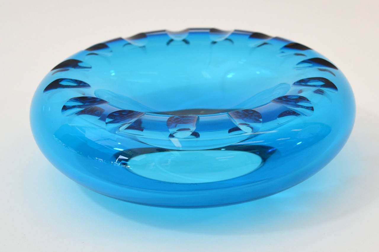 Turquoise glass ashtray designed by Marc Newson. Signed.