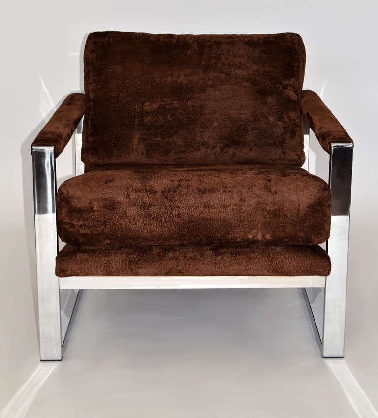Pair of upholstered lounge arm chairs in chrome plated flat bar steel frames. with original chocolate brown velvet upholstery. Loose seat and back cushions.