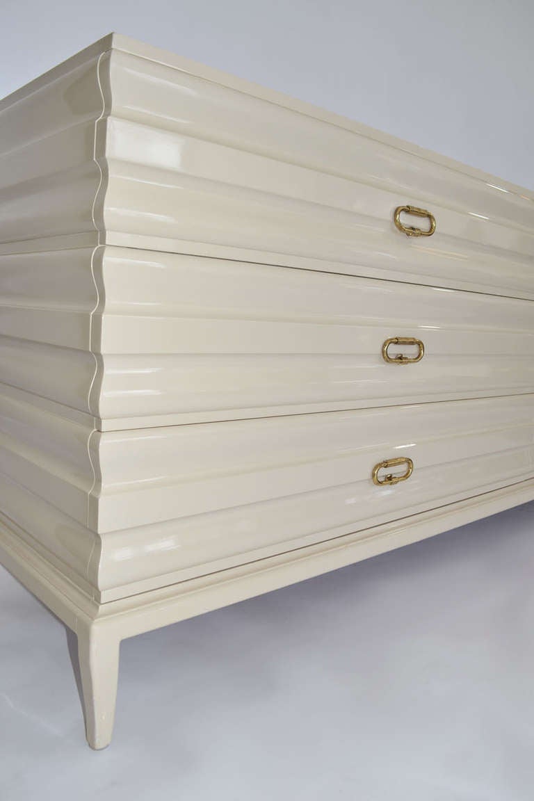 Sculpted-Front Chest of Drawers by Tommi Parzinger, Oatmeal with Brass Pulls In Good Condition In Ft Lauderdale, FL