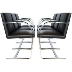 Set of Six Brueton Arm Chairs in Polished Steel and Leather