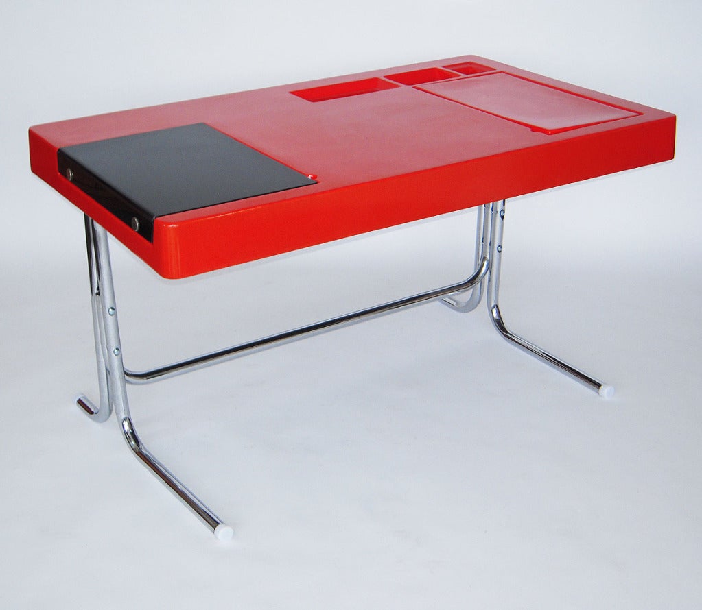 Super cool fiberglass desk or work table in striking red, with various open/covered compartments as shown. Chrome plated steel legs.


Similar Style Ref.: Verner Panton, Joe Colombo, Nana Dietzel, Castiglioni