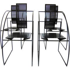 Four Ultra Modern Steel chairs designed by Mario Botta