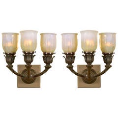 Pair of Tiffany Studios: "Tulip" Bronze and Favrile Glass Tri-Armed Sconces