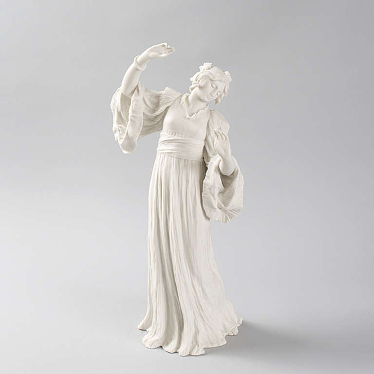 A French Art Nouveau bisque ceramic figural sculpture by Agathon Léonard and manufactured by Sevres, titled 