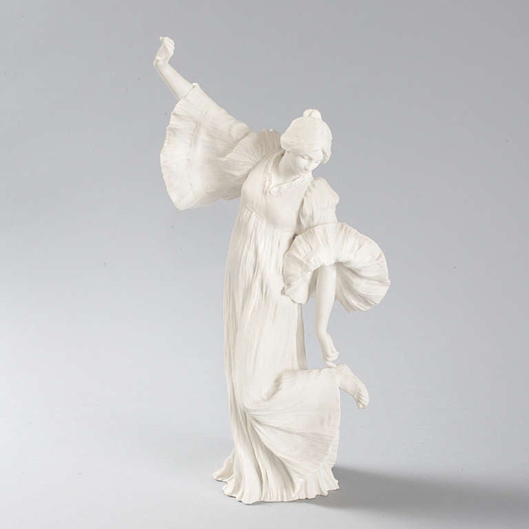 A French Art Nouveau bisque ceramic figural sculpture by Agathon Léonard, featuring a woman holding her dress with her right hand. Titled 