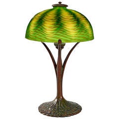 Tiffany Studios New York patinated Bronze and Favrile Glass Table Lamp
