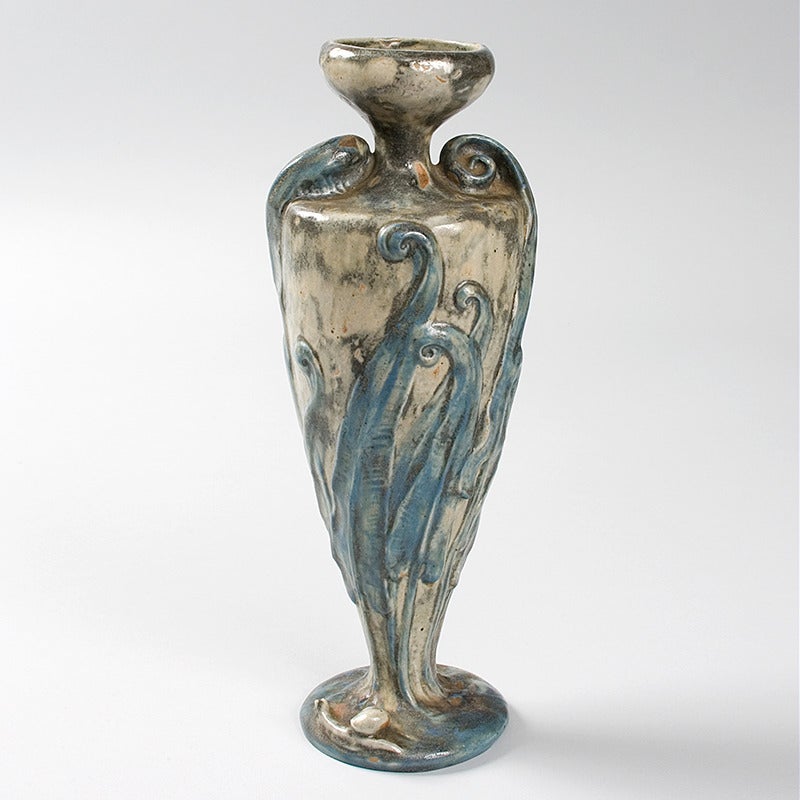 A French Art Nouveau ceramic urn designed by Louis Majorelle and produced by Mougin, featuring swirls of blue on a beige and ash-colored ground, and a snail at the base, circa 1900. Similar piece pictured in: Les Frères Mougin, sorciers du grand