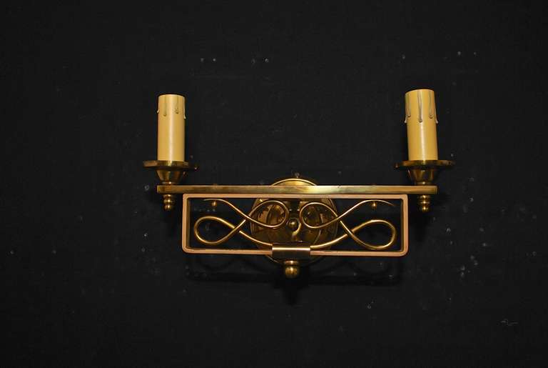 French Elegant pair of  Sconces by Jules Leleu For Sale