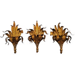 Antique set of three Italian gold metal sconces