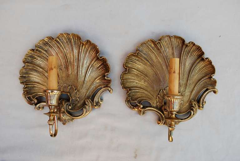 We have over 3,000 antique sconces and over 1,000 antique lights. If you need a specific pair of sconces or lights, use the contact dealer button to ask us, we might have it in our store.
We also have our own line of wrought iron reproduction