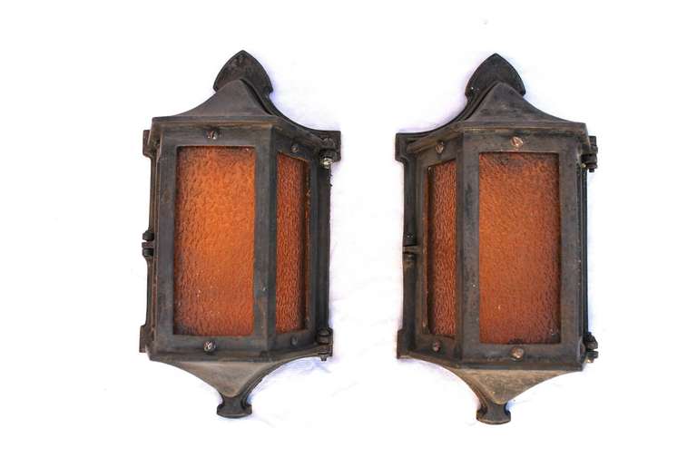 A very nice set of seven1920 outdoor cast iron sconces, the glass can be change if you like, we can sell it has a pair also, it is made of heavy cast iron.

We have over three thousand antique sconces and over one thousand antique lights, if you